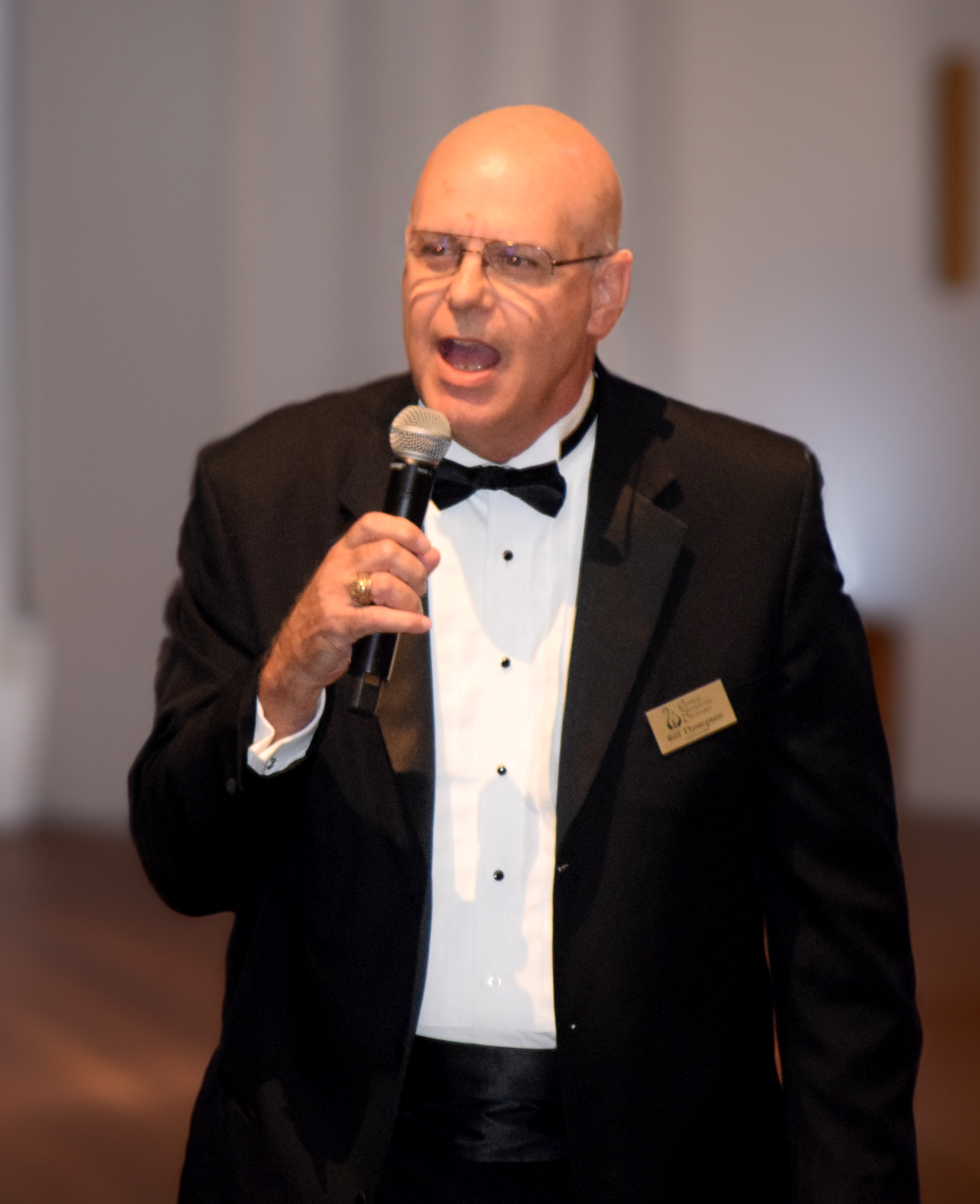 A man in a tuxedo.